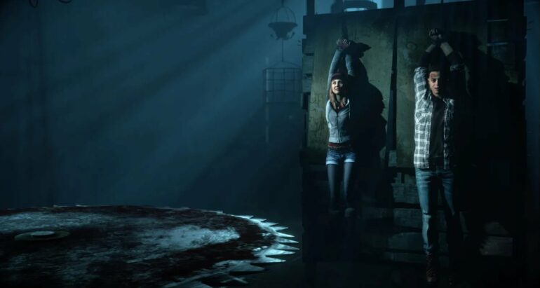 until dawn Horror game two people tied up with saw coming towards them