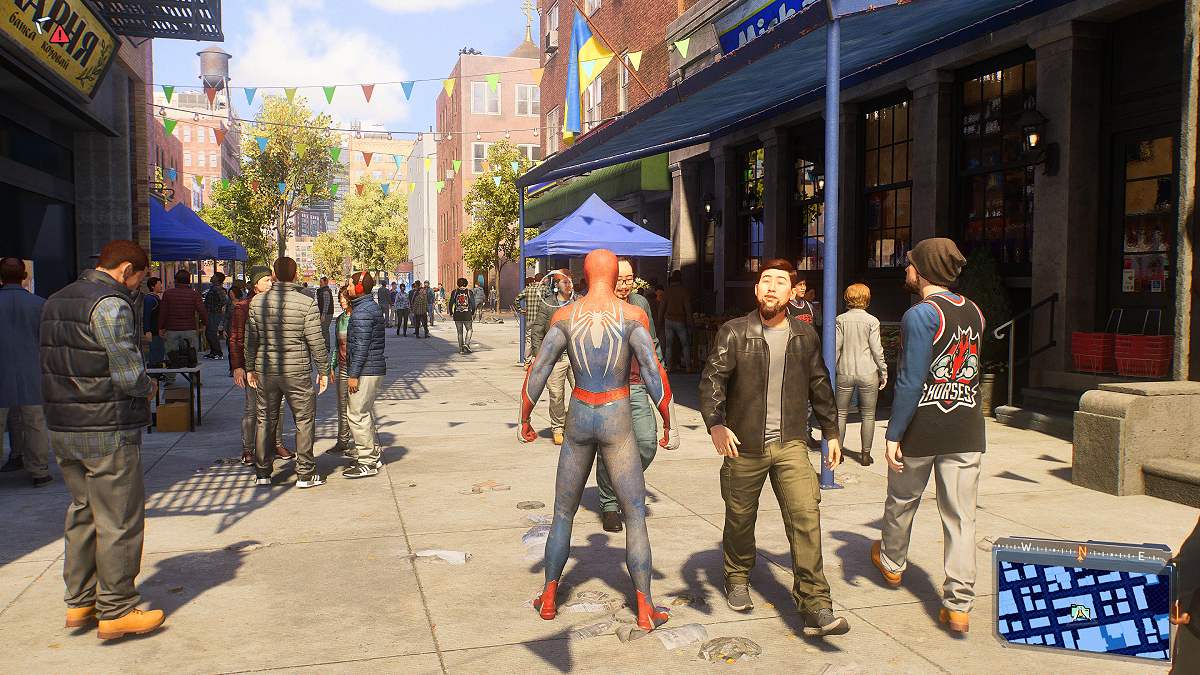 Peter stood in a busy street in New York in Marvel's Spider-Man 2