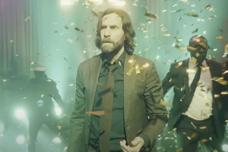 Live action Alan Wake in the Alan Wake 2 mission We Sing
