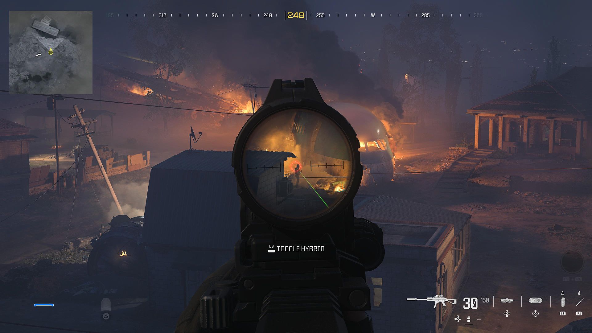 The player aiming down sights at an enemy in MW3