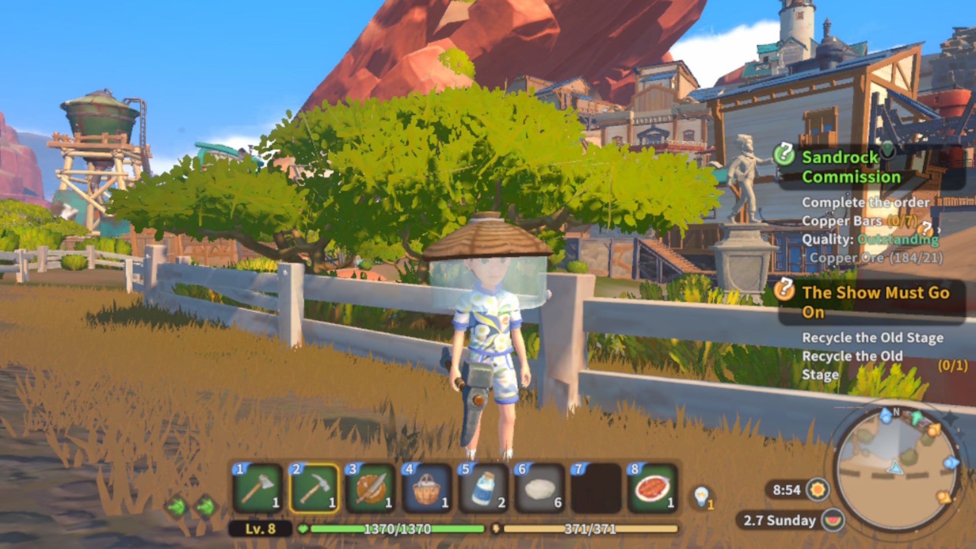 The player standing near a tree in My Time at Sandrock