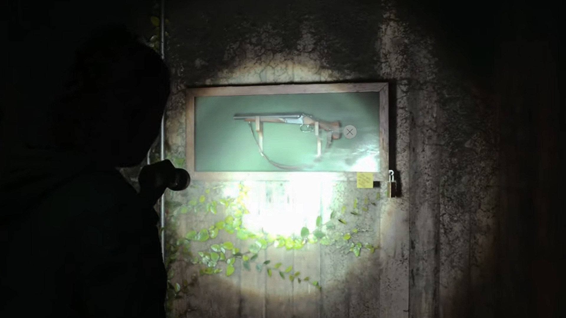 Saga looking at a Sawed-Off Shotgun in Alan Wake 2