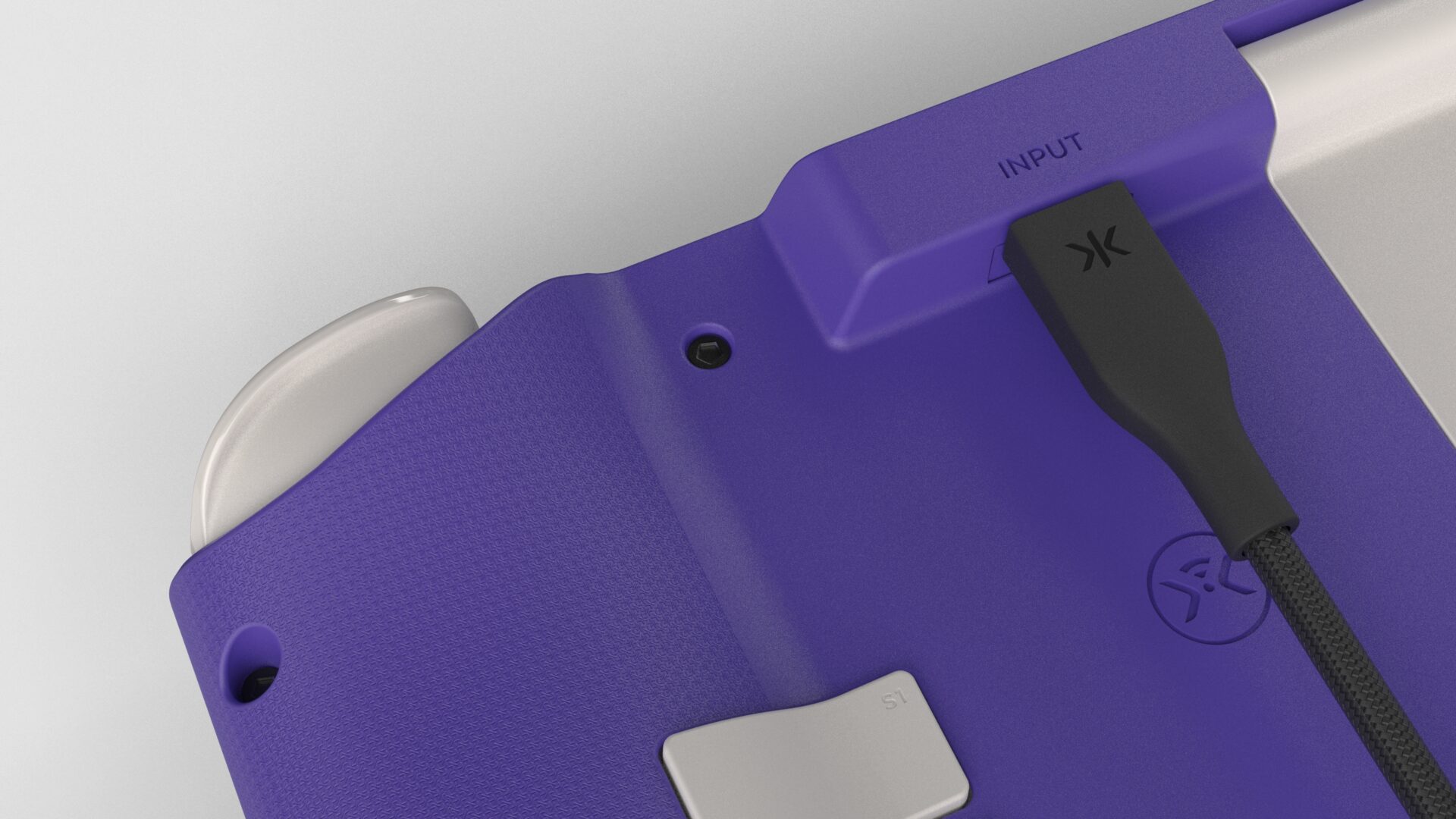 The CRKD Nitro Deck with a USB-C Cable in it