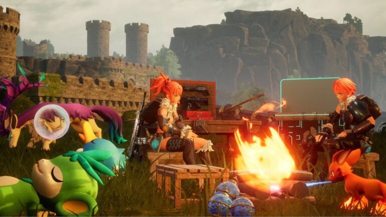 Players sat in their camp in Palworld