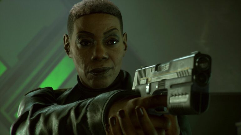 Amanda Waller holding a gun in Suicide Squad: Kill the Justice League