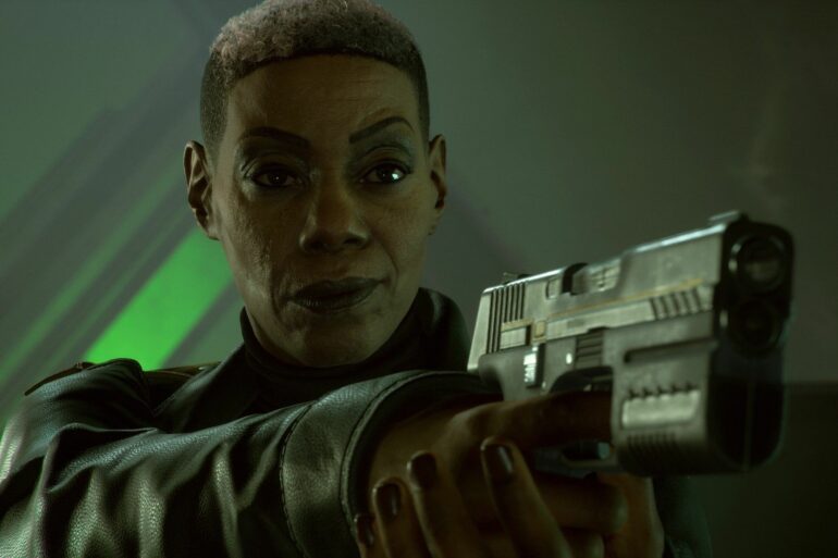 Amanda Waller holding a gun in Suicide Squad: Kill the Justice League