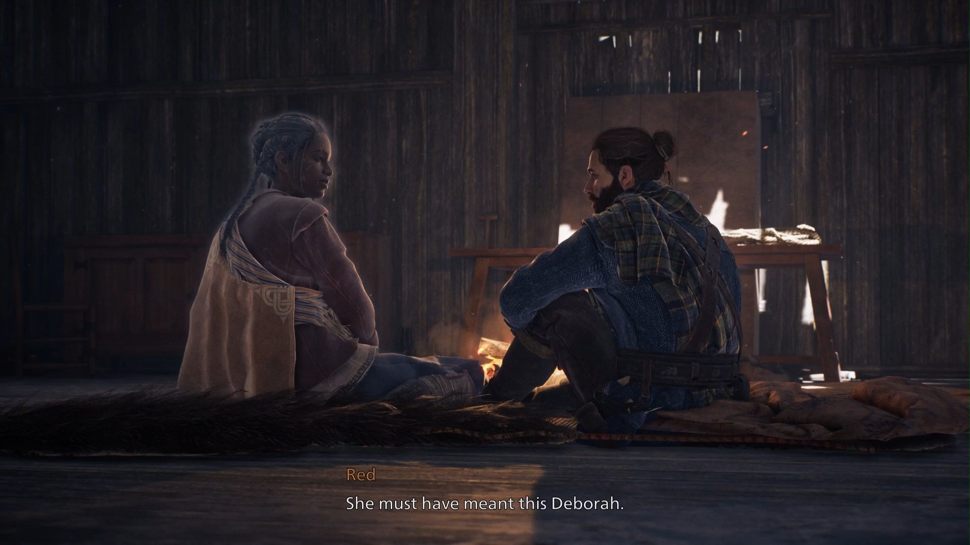 Red and Antea talking at a campfire in Banishers: Ghosts of New Eden