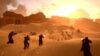 Group of four players shooting Terminids in Helldivers 2