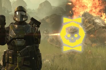 Helldiver doing fist emote to camera next to Medal icon in front of another player using a flamethrower against a charger in Helldivers 2