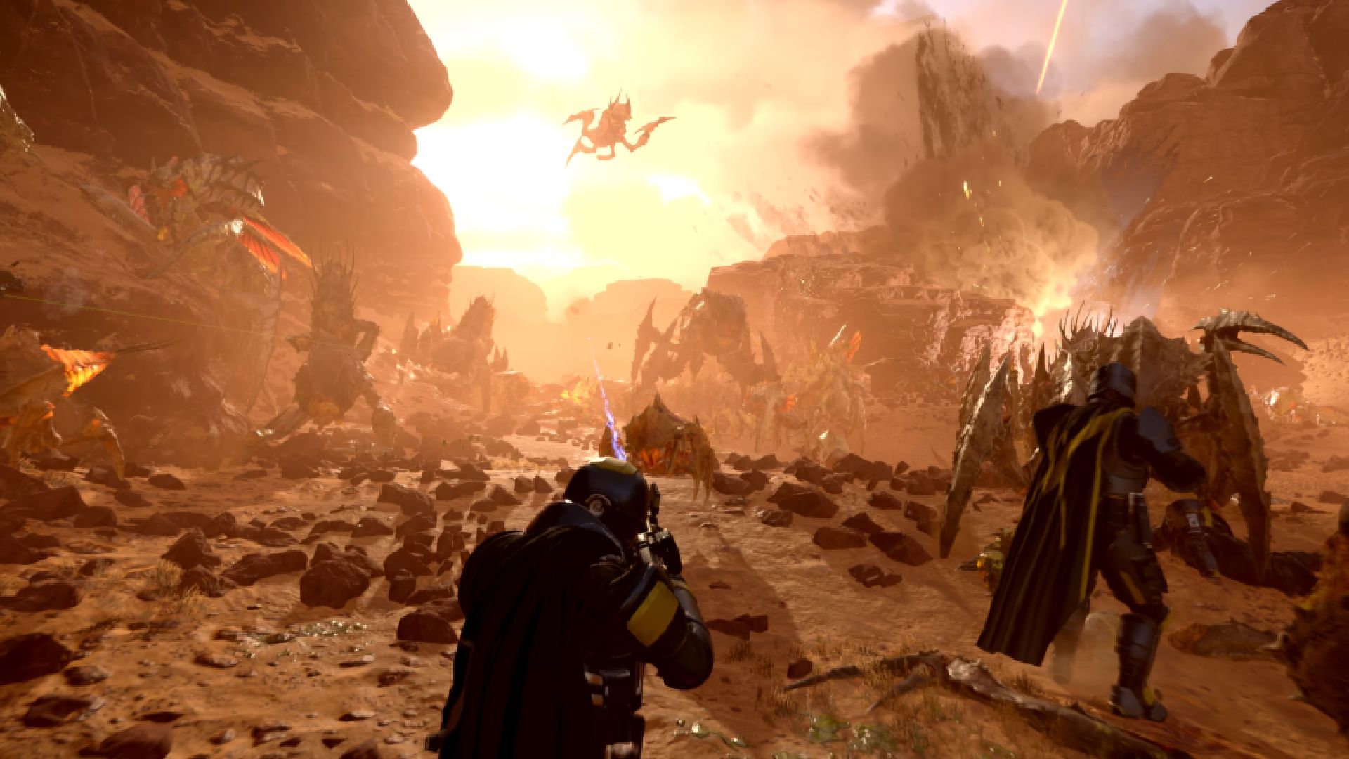 Players shooting Terminids in Helldivers 2