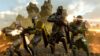 Four Helldivers standing next to each other shooting in Helldivers 2