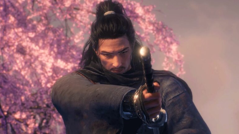The player next to a cherry blossom tree in Rise of the Ronin