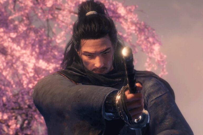 The player next to a cherry blossom tree in Rise of the Ronin
