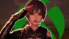 Stellar Blade character with the Xbox logo behind them